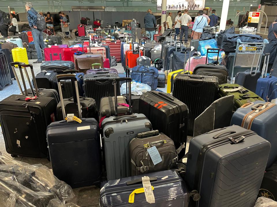 Unclaimed luggage piles up at London Heathrow Airport on July 8, 2022.
