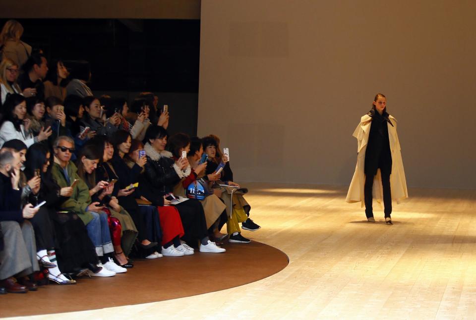 A model wears a creation for Celine's Fall-Winter 2017/2018 ready-to-wear fashion collection presented Sunday, March 5, 2017 in Paris. (AP Photo/Francois Mori)