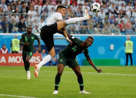 Soccer Football - World Cup - Group D - Nigeria vs Argentina - Saint Petersburg Stadium, Saint Petersburg, Russia - June 26, 2018 Argentina's Marcos Rojo in action with Nigeria's Kelechi Iheanacho REUTERS/Jorge Silva