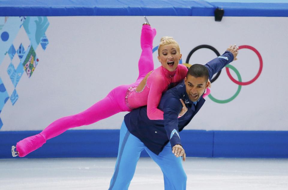 Germany's Aliona Savchenko and Robin Szolkowy compete during the Figure Skating Pairs Short Program at the Sochi 2014 Winter Olympics, February 11, 2014. REUTERS/David Gray (RUSSIA - Tags: OLYMPICS SPORT FIGURE SKATING)