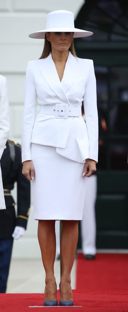 She donned a big white hat during the official welcoming ceremony. (Photo: Getty Images)