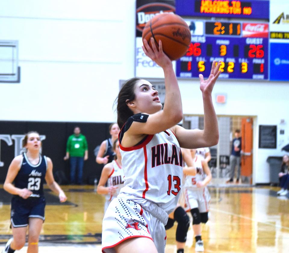 Ashley Mullet turned a turnover into an easy layup for the Hawks during second half action of the Div. IV Regional championship win over Portsmouth Notre Dame.
