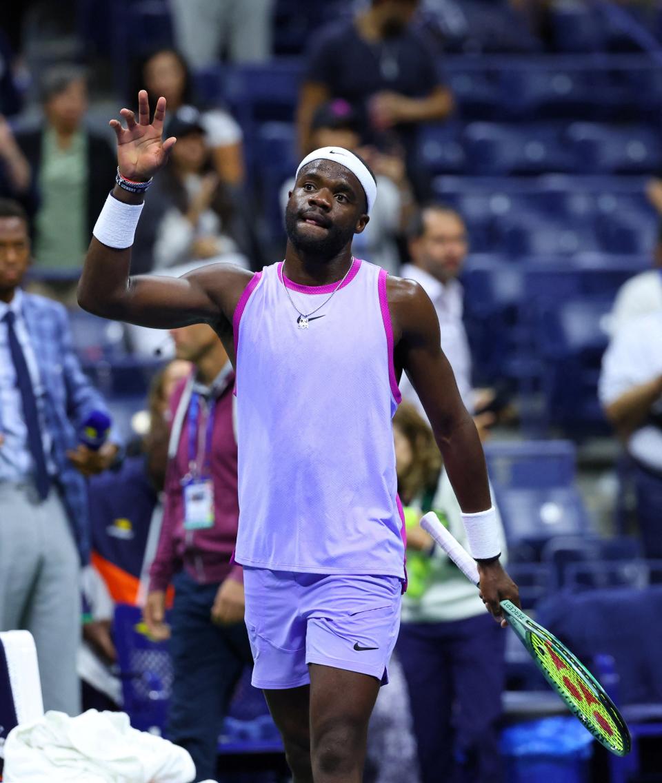 Frances Tiafoe of the US celebrates after winning his quarter final match against Bulgaria’s Grigor Dimitrov (Reuters)