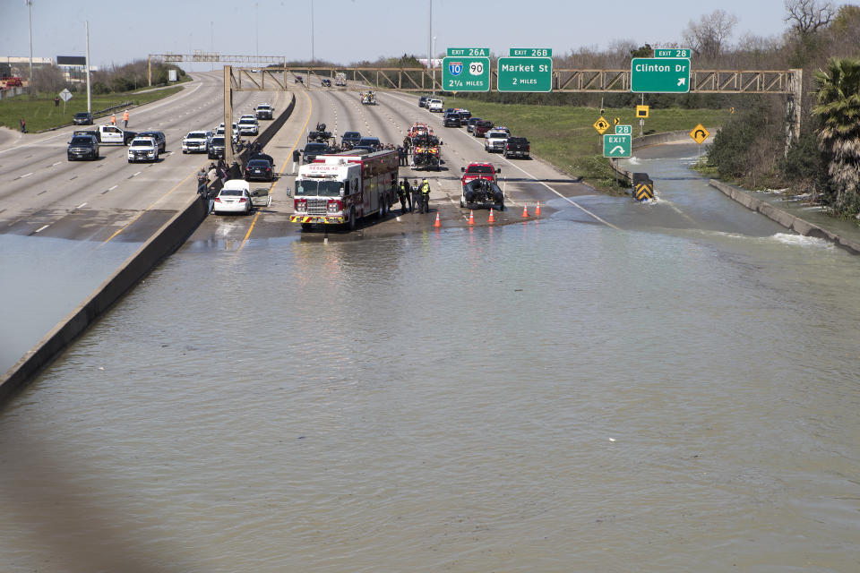 High water from a water main break floods the East Loop 610 on Thursday, Feb. 27, 2020 in Houston. The flooding closed the major freeway that circles the city. ( Brett Coomer/Houston Chronicle via AP)