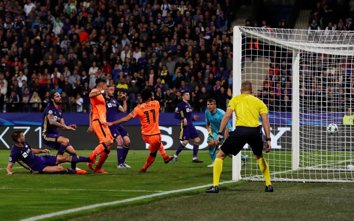 Mohamed Salah scores Liverpool's fourth goal on Tuesday night - Action Images via Reuters