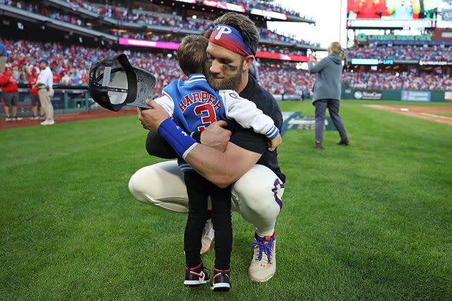 <p>Bryce Harper/Instagram</p> Bryce Harper hugging son Krew after a Phillies game