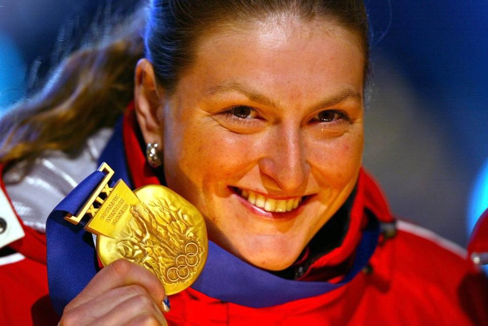 Alpine skier Janica Kostelic, of Croatia, displays her latest gold medal on Friday, Feb 22, 2002, at the Olympic Medals Plaza in downtown Salt Lake City. | Chuck Wing, Deseret News