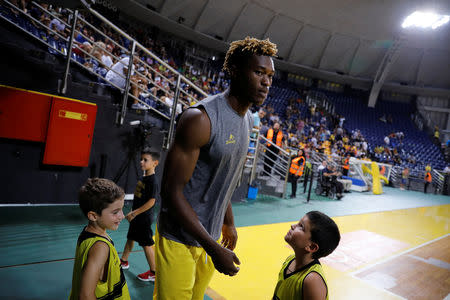 Congolese basketball player Christ Wamba enters the court after halftime during a friendly game between Aris Thessaloniki BC and Istanbul BB at the Alexandreio Melathron Nick Galis Hall in Thessaloniki, Greece, September 12, 2018. REUTERS/Alkis Konstantinidis