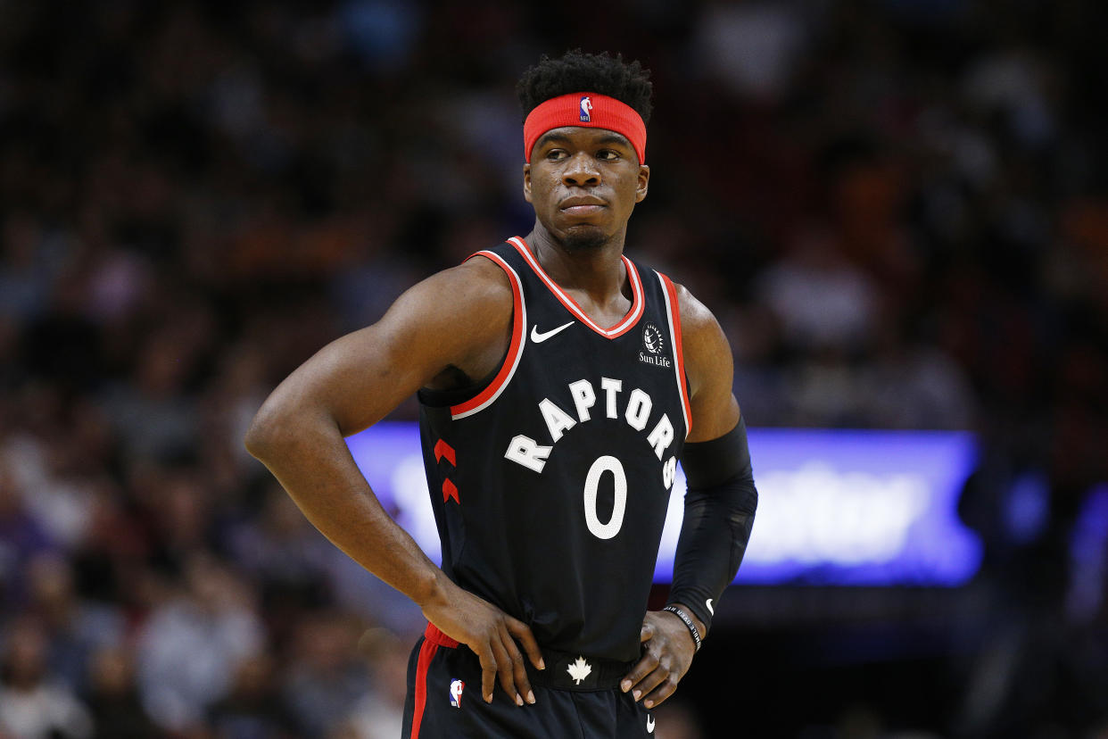 MIAMI, FLORIDA - JANUARY 02:  Terence Davis #0 of the Toronto Raptors looks on against the Miami Heat during the second half at American Airlines Arena on January 02, 2020 in Miami, Florida. NOTE TO USER: User expressly acknowledges and agrees that, by downloading and/or using this photograph, user is consenting to the terms and conditions of the Getty Images License Agreement. (Photo by Michael Reaves/Getty Images)