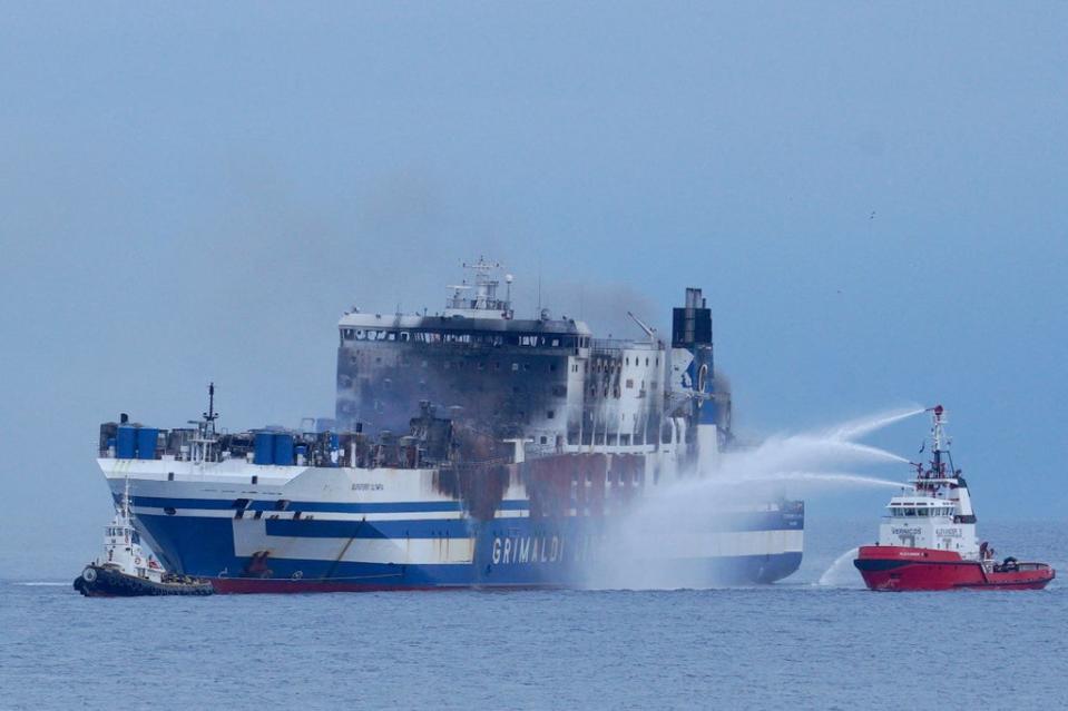 Smoke rises from the Italian-flagged Euroferry Olympia (REUTERS)