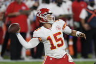 Kansas City Chiefs quarterback Patrick Mahomes throws a touchdown pass to Kansas City Chiefs wide receiver Mecole Hardman during the first half of an NFL football game against the Baltimore Ravens, Monday, Sept. 28, 2020, in Baltimore. (AP Photo/Nick Wass)