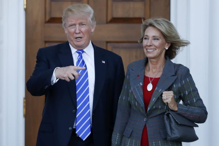 President-elect Donald Trump and Betsy DeVos at Trump National Golf Club in Bedminster, N.J., after a meeting last weekend. (Photo: Carolyn Kaster/AP)