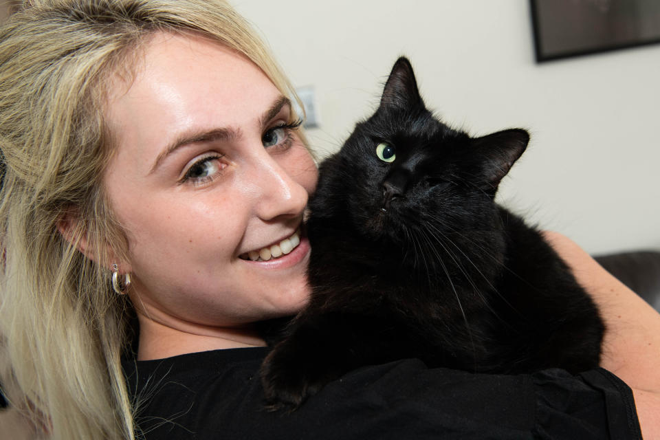 <p>EDITORIAL USE ONLY Jessica Barnard from Essex with her pet cat Mikey, who has been announced as the winner of the 'Outstanding Rescue Cat' category and is now a finalist in this year's Cats Protection National Cat Awards, sponsored by Purina. Issue date: Thursday August 5, 2021.</p>
