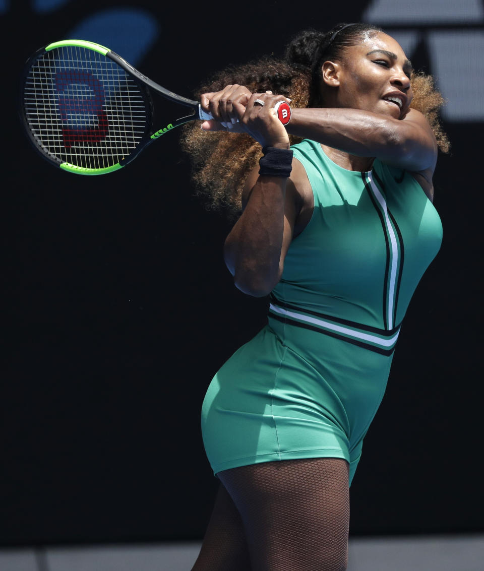 United States' Serena Williams hits a backhand return to Germany's Tatjana Maria during their first round match at the Australian Open tennis championships in Melbourne, Australia, Tuesday, Jan. 15, 2019. (AP Photo/Kin Cheung)