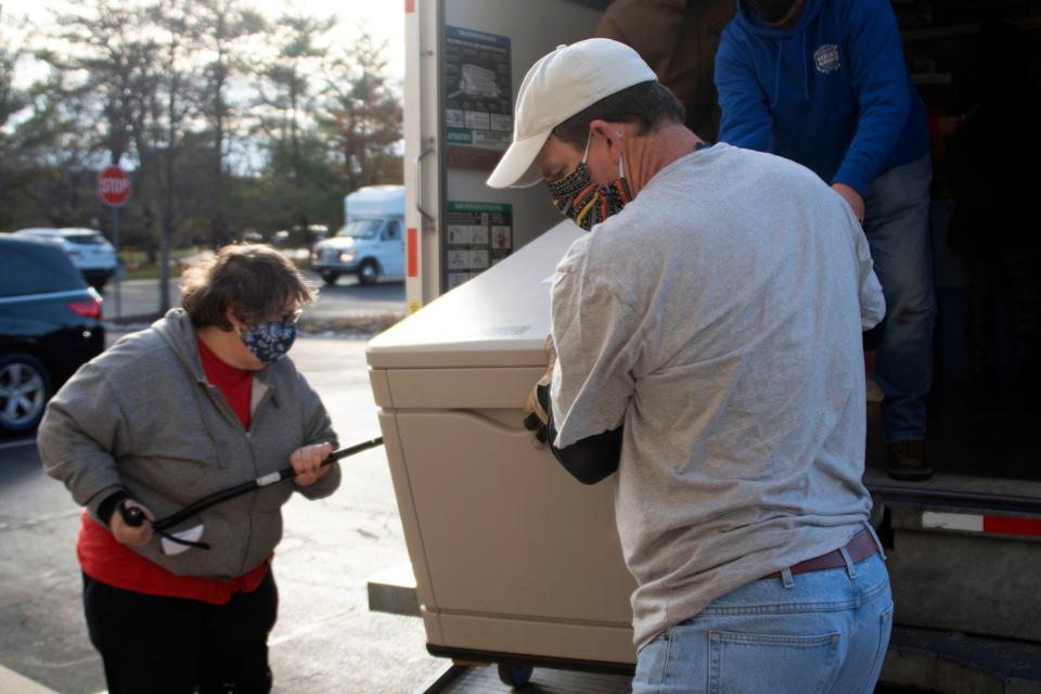 AHTN volunteers unload a truck full of shelter materials at Woodside Presbitarian Church in Yardley on Friday, Dec. 3, 2021. Advocates for Homeless and Those in Need (AHTN) will host its Code Blue Shelter in this location through December and January before it is moved to Calvary Baptist Church in Bristol for February and March.