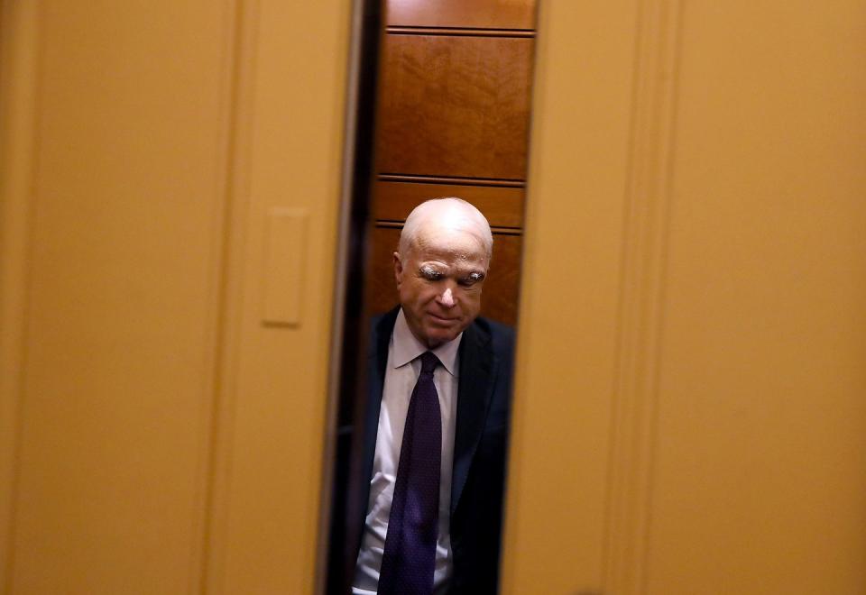 <p>McCain takes an elevator to the U.S. Capitol on July 26, 2017.</p>