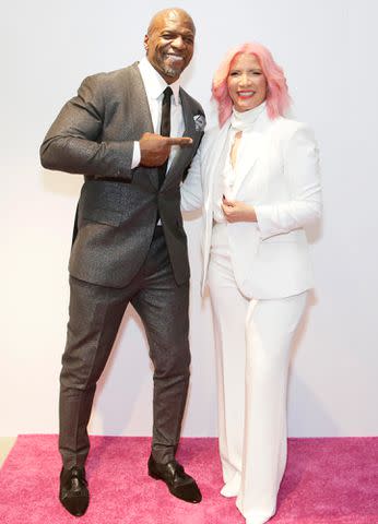 <p>Santiago Felipe/Getty</p> Terry Crews and Crews at the Rebecca Crews Fashion Show at Bernhardt Gallery in 2023.