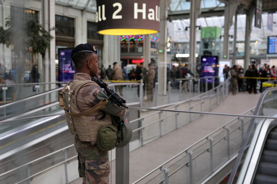 A French soldier of the Sentinelle security operation stands guard in a hall after a knife attack at Paris's Gare de Lyon railway station (AFP via Getty Images)