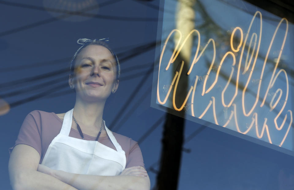 In this Thursday, Feb. 21, 2013 photo, Christina Tosi, pastry chef and founder of Momofuku Milk Bar, poses for a picture at Milk Bar in New York. Cereal is going out of the box. Milk, ice cream, muffin mix and more are being infused with the flavor of the classic childhood treat. (AP Photo/Seth Wenig)