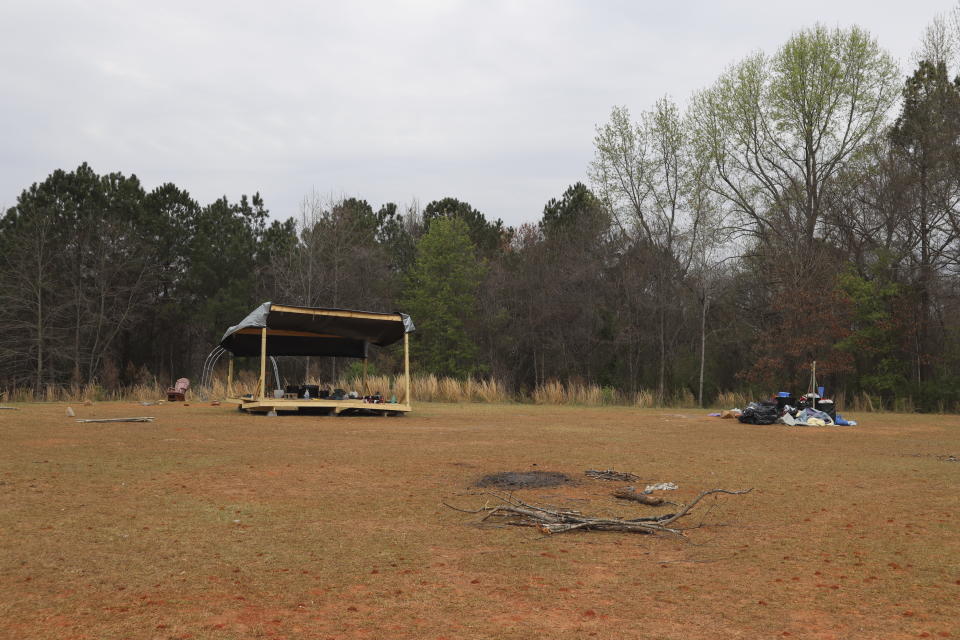 The stage used during the South River Music Festival is shown in DeKalb County, Ga. on March 9, 2023, four days after police stormed the event and arrested 23 people on charges of domestic terrorism in connection with the destruction of construction equipment. Activists have been protesting the planned construction of a nearby police training center, calling it "Cop City." (AP Photo/R.J. Rico)