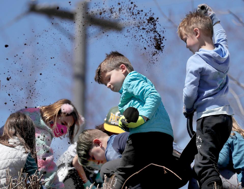 Students at Fox River Academy help install a Hugelkultur garden during a previous Earth Day activity. Fox River Academy is among numerous charter schools available to students in the Appleton area. The deadline to apply is Feb. 17.