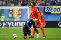 <p>France’s forward Antoine Griezmann and Belgium’s midfielder Marouane Fellaini in action during the Russia 2018 World Cup semi-final football match between France and Belgium at the Saint Petersburg Stadium in Saint Petersburg on July 10, 2018. (Photo by Paul ELLIS / AFP) </p>