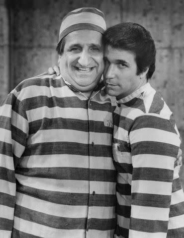 <p>ABC Photo Archives/Disney General Entertainment Content via Getty</p> Al Molinaro and Henry Winkler on 'Happy Days' in 1981