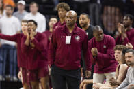 Florida State head coach Leonard Hamilton watches his team during the first half of an NCAA college basketball game against Virginia in Charlottesville, Va., Saturday, Dec. 3, 2022. (AP Photo/Mike Kropf)