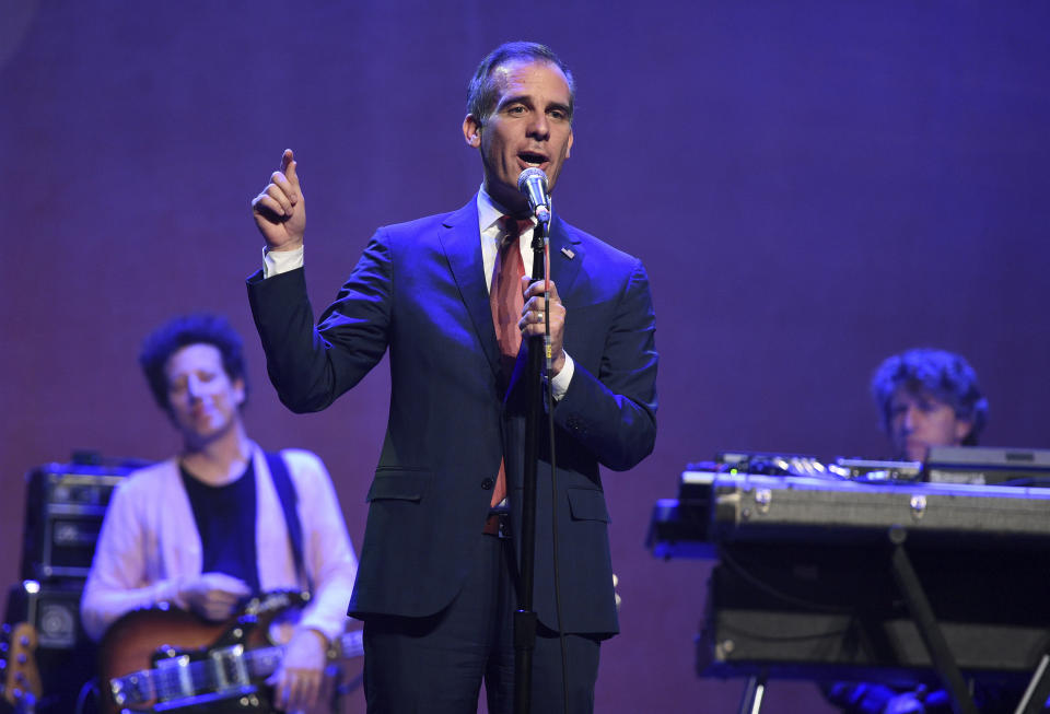 Los Angeles Mayer Eric Garcetti addresses the audience at The Last Weekend Rally presented by Swing Left at the Palace Theatre, Thursday, Nov. 1, 2018, in Los Angeles. The event was organized by the progressive Swing Left political group, with the aim of spurring get-out-the-vote efforts on the last weekend before the midterm elections. (Photo by Chris Pizzello/Invision/AP)