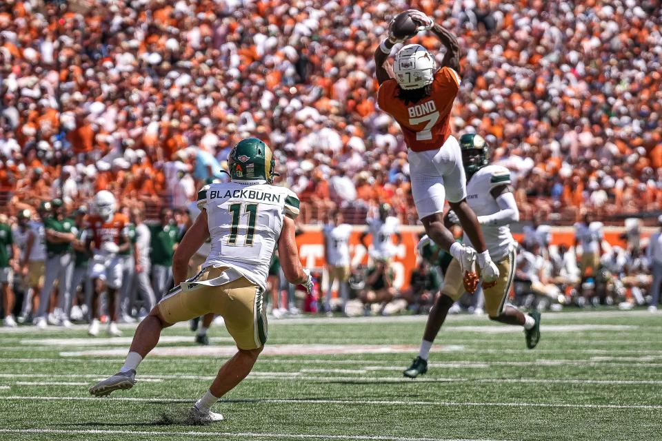 Texas Longhorns receiver Isaiah Bond (7) catches a pass during the game against Colorado State at Darrell K Royal-Texas Memorial Stadium in Austin Saturday, Aug. 31, 2024.