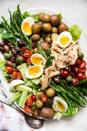 <p>The (green) beauty of this salad recipes is that it makes use of all the random leftovers you have in the fridge — including one of the green bean recipes from this list.</p><p>Get the <strong><a href="https://themodernproper.com/easy-nicoise-salad" rel="nofollow noopener" target="_blank" data-ylk="slk:Easy Niçoise Salad recipe;elm:context_link;itc:0;sec:content-canvas" class="link ">Easy Niçoise Salad recipe</a></strong> at The Modern Proper.</p>