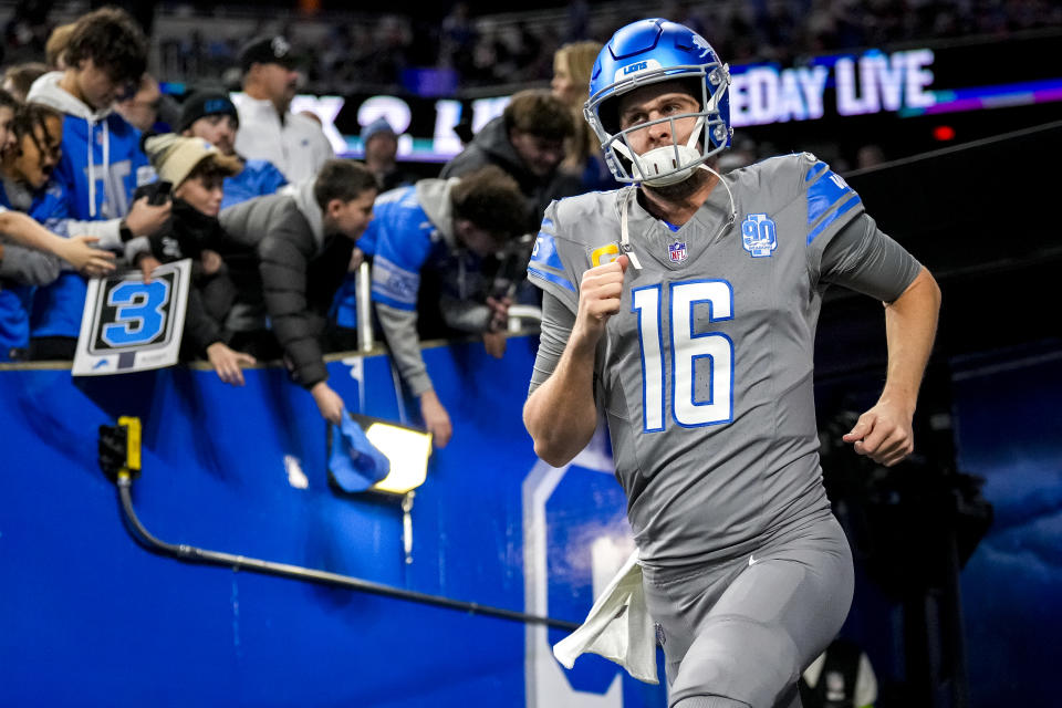 DETROIT, MICHIGAN - JANUARY 07: Jared Goff #16 of the Detroit Lions runs to the field before the game against the Minnesota Vikings at Ford Field on January 07, 2024 in Detroit, Michigan. (Photo by Nic Antaya/Getty Images)