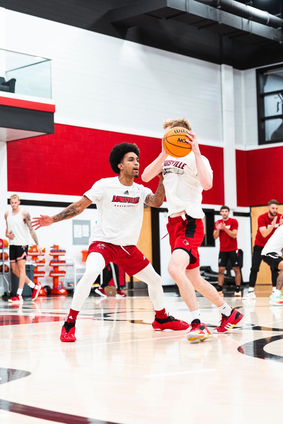 Chucky Hepburn gets into a defensive stance during a Louisville basketball summer workout at the Planet Fitness Kueber Center. Hepburn spent the first three seasons of his career at Wisconsin and made the Big Ten's All-Defensive Team as a junior.