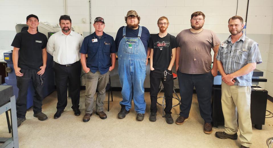 The TCAT Harriman group involved in making the atom "ball" for Oak Ridge's event include Gauge Styler, Chris Ayers, Craig Heaton, Joseph Griffith, Chad Tucker, Gabriel Aytes, and instructor Andrew Aydelott.