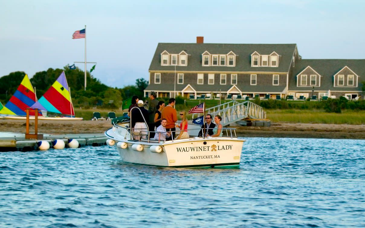 Revellers aboard the Wauwinet Lady boat off the Wauwinet Hotel, Nantucket