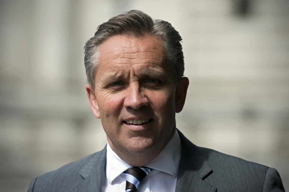 Justin King, CEO of British supermarket chain Sainsbury's, is pictured as he arrives for the company's Annual General Meeting (AGM) in central London on July 9, 2014. King is expected to step down as CEO later Wednesday after 10 years at the helm. AFP PHOTO / CARL COURT (Photo by CARL COURT / AFP) (Photo by CARL COURT/AFP via Getty Images)