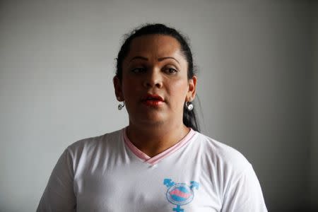 Karla Avelar, executive director of the Association for Communicating and Training Trans Women (COMCAVIS TRANS), pose for a picture at her office in San Salvador, El Salvador, May 12, 2017. REUTERS/Jose Cabezas