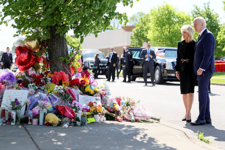 President Biden and first lady Jill Biden at a makeshift memorial outside a Tops supermarket. 