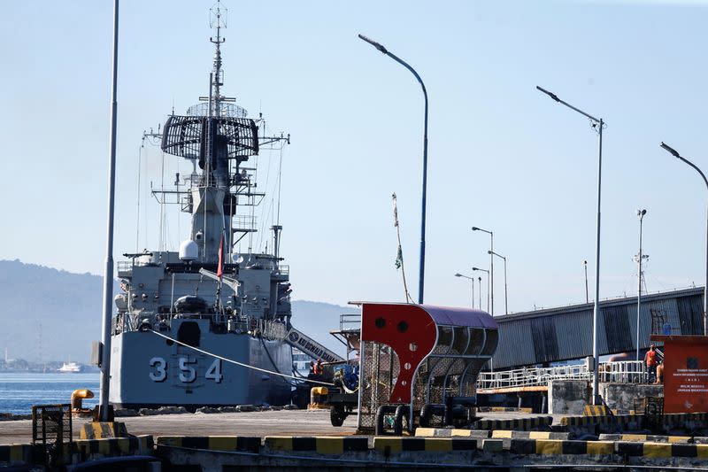 Indonesian Navy's KRI Oswald Siahaan-354 prepare to leave the Tanjung Wangi port as the search continues for the missing KRI Nanggala-402 submarine