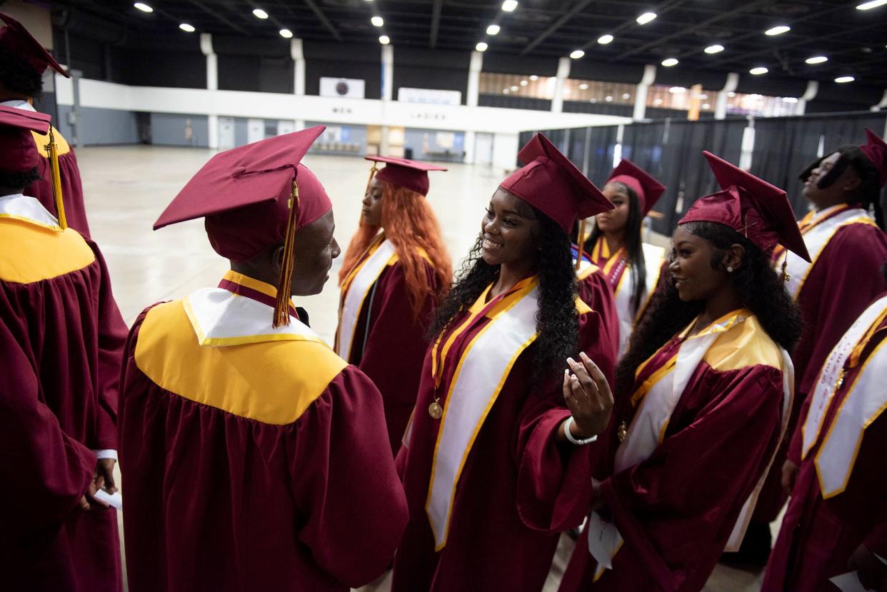Graduates line up for the Glades Central Community High School graduation ceremony at the South Florida Fairgrounds on May 20, 2024 in West Palm Beach.