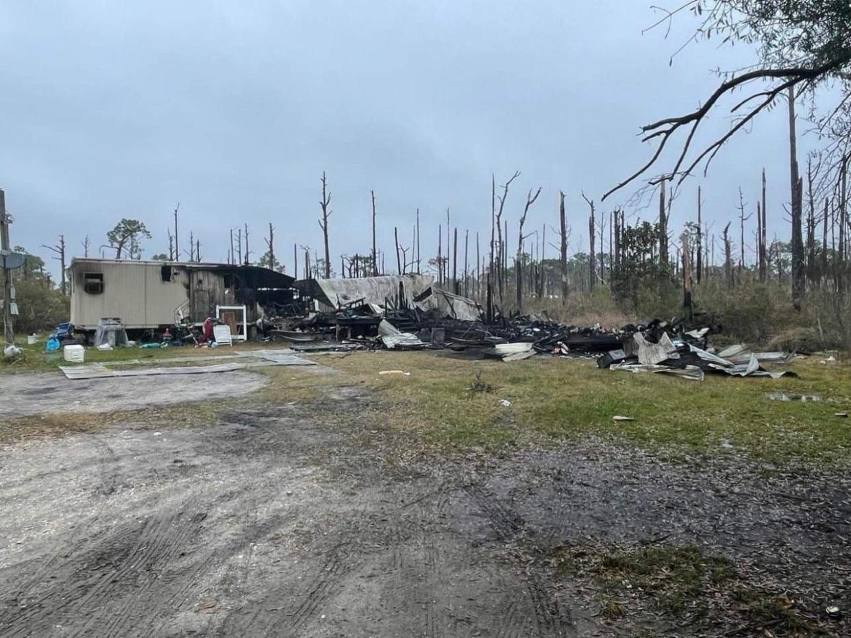 A mobile home fire killed two children and at least one puppy in Eastpoint Friday morning.