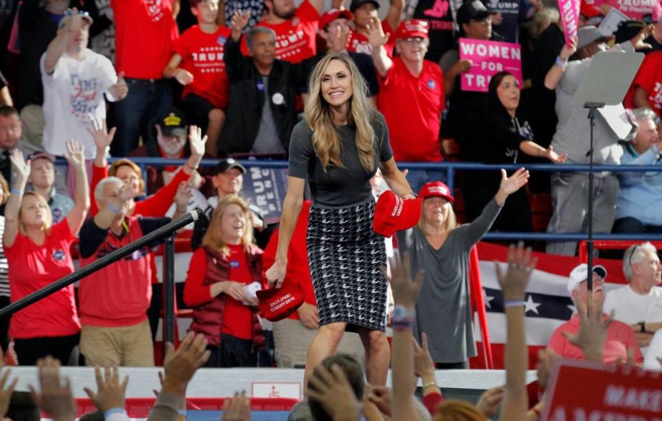 Lara Trump, former President Donald Trump’s daughter in law, who is from Wrightsville Beach and attended N.C. State, tosses Trump ballcaps to the crowd after she spoke before Donald Trump’s speech as he campaigns at Dorton Arena in Raleigh, North Carolina, on Monday, Nov. 7, 2016.