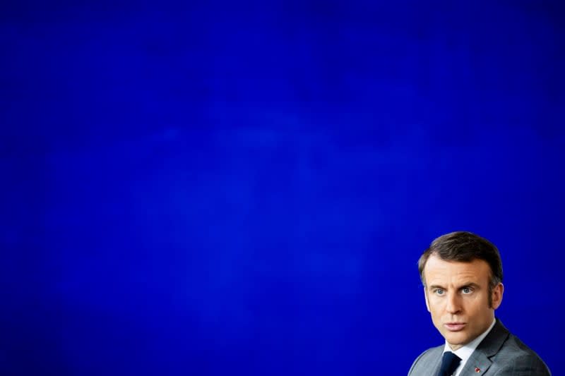 French President Emmanuel Macron makes a press statement after a joint meeting at the Federal Chancellery. Christoph Soeder/dpa