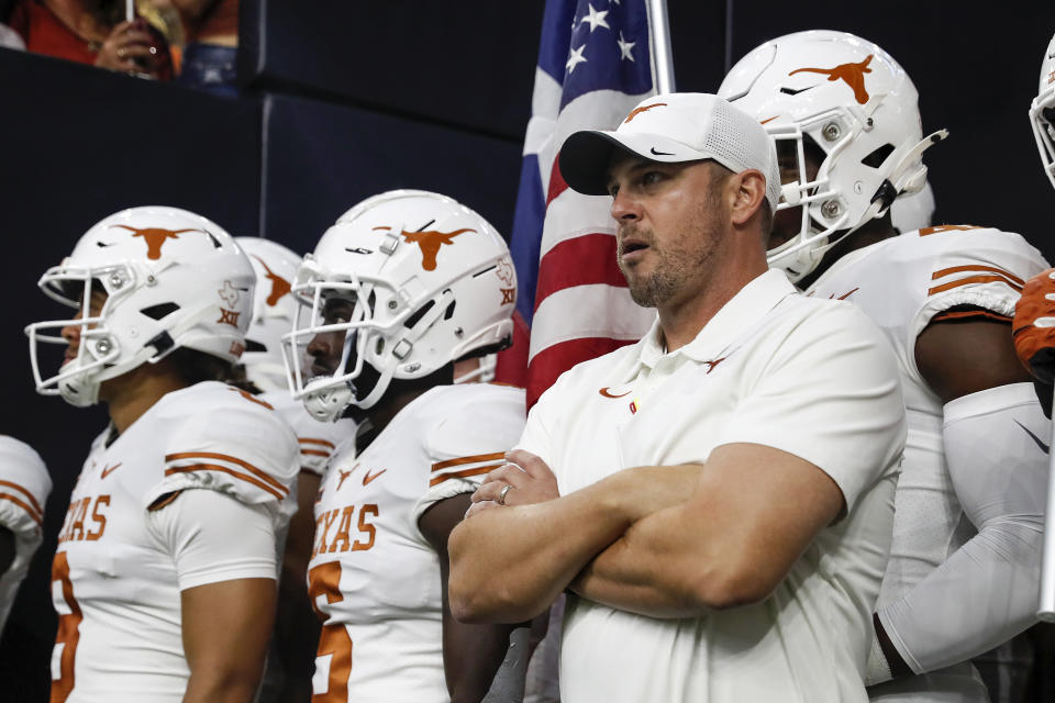 Texas coach Tom Herman prepares to lead the team onto the field before a game against Rice on Sept. 14, 2019. (Tim Warner/Getty Images)