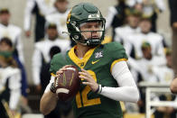 Baylor quarterback Blake Shapen looks downfield while throwing against Texas Tech in the first half of an NCAA college football game, Saturday, Nov. 27, 2021, in Waco, Texas. (Rod Aydelotte/Waco Tribune-Herald via AP)