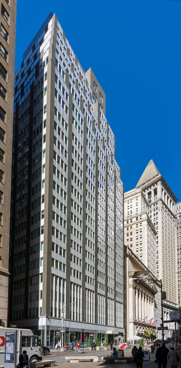 The exterior of 20 Broad Street, the former home of the New York Stock Exchange, a newly residential building.