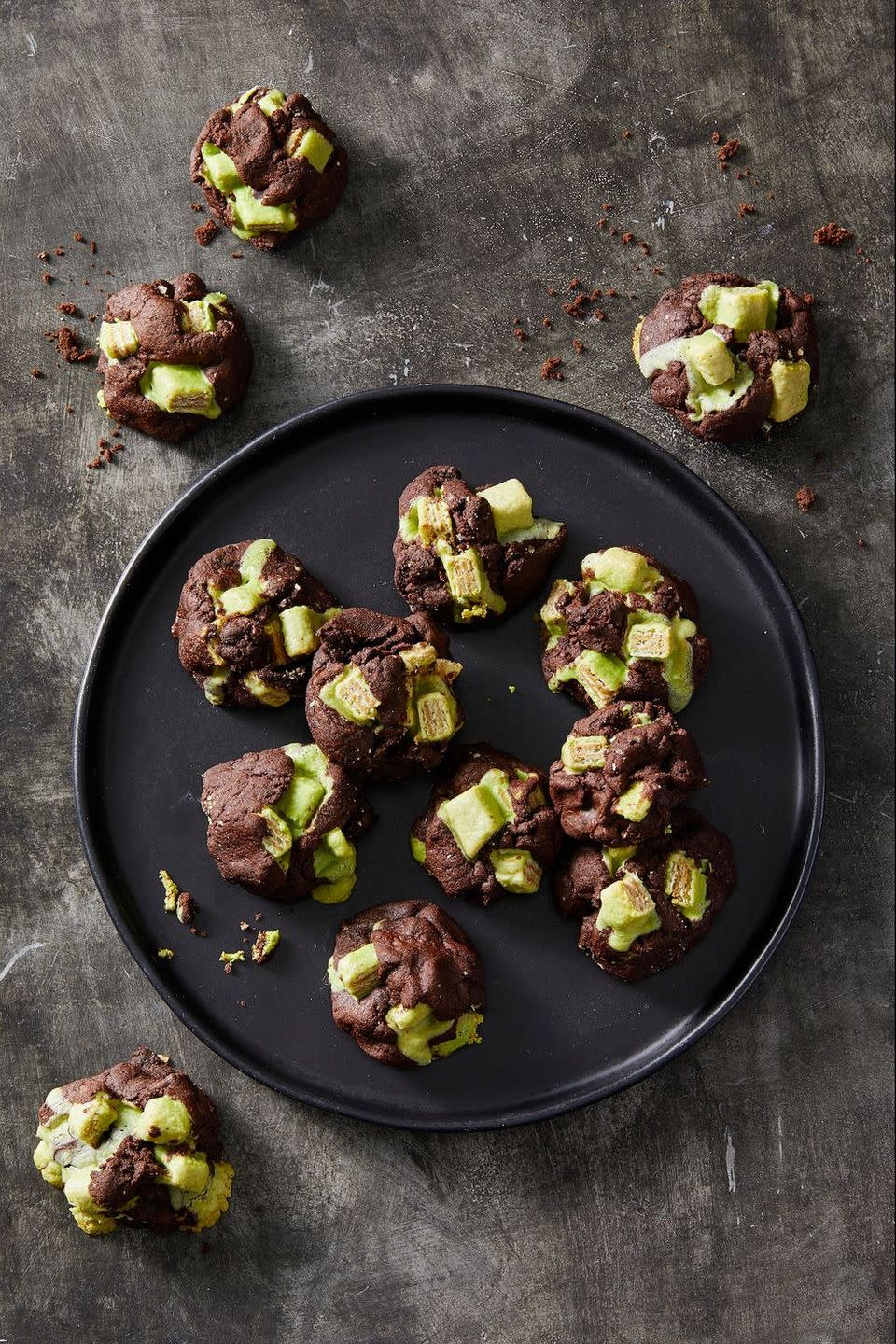 <p>Cracked pieces of matcha tea KitKats (yes, they exist!) are hiding among chocolate chunks in these delicious dark chocolate cookies.</p><p><em><a href="https://www.goodhousekeeping.com/food-recipes/a28541666/dark-chocolate-candy-cookies-recipe/" rel="nofollow noopener" target="_blank" data-ylk="slk:Get the recipe for Dark Chocolate Candy Cookies »;elm:context_link;itc:0;sec:content-canvas" class="link ">Get the recipe for Dark Chocolate Candy Cookies »</a></em></p>