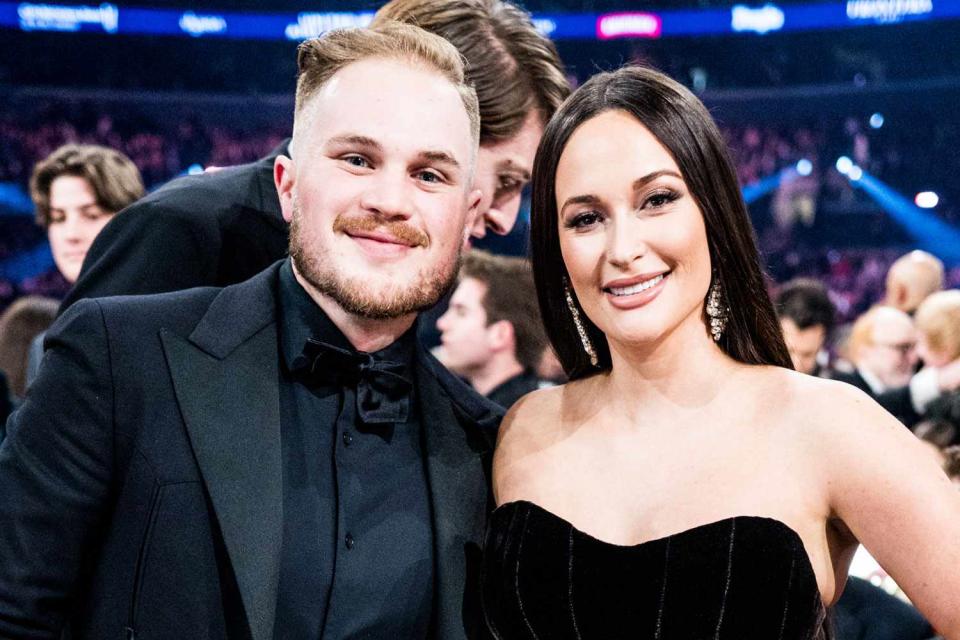 <p>John Shearer/Getty</p> Zach Bryan and Kacey Musgraves