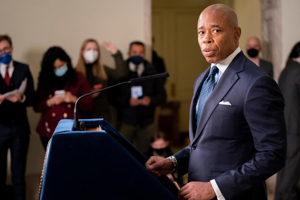 FILE - New York City Mayor Eric Adams speaks during a news conference at City Hall, Jan. 24, 2022, in New York. Gun violence that has been rising since the pandemic is spiking anew, and beleaguered cities are struggling with how to manage it.