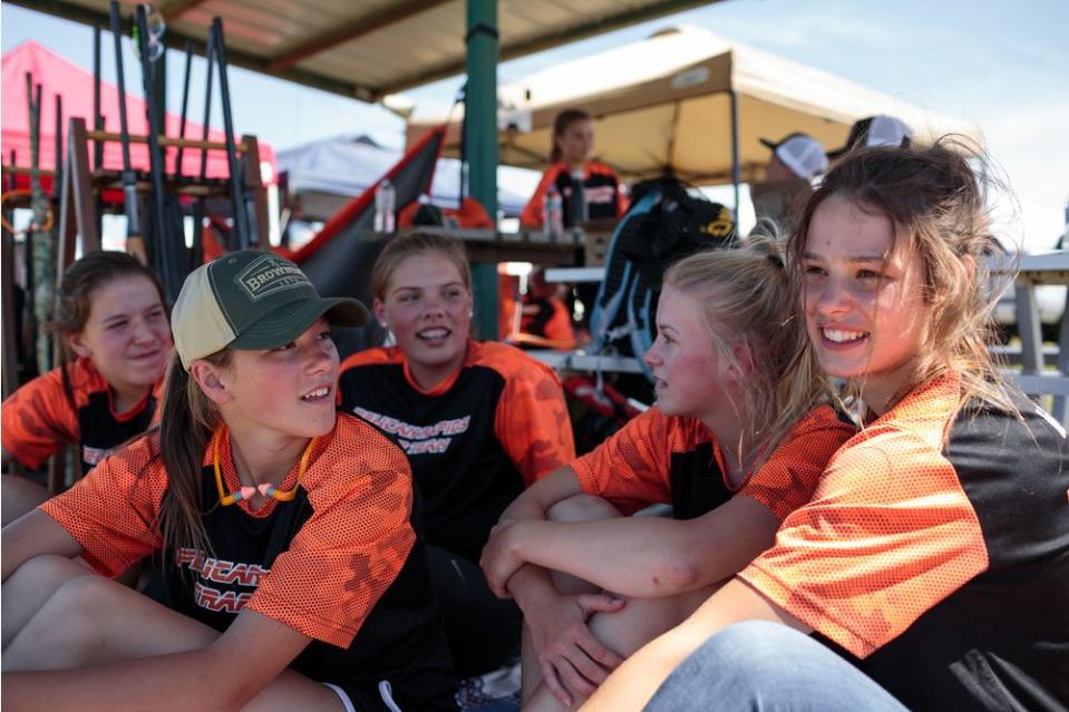 Shooters from Pelican Rapids, MN, hang out together after finishing their competition.